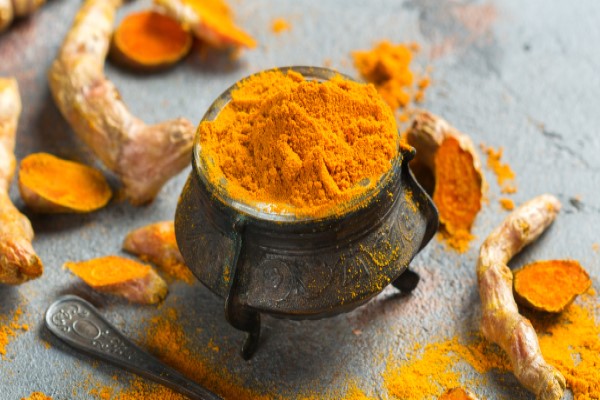 Decorative Pot with Tumeric Overflowing in it