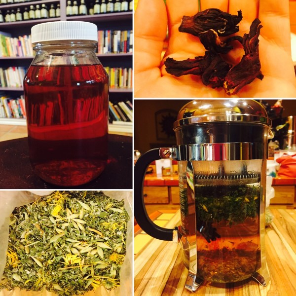A jar filled with a maple colored liquid; Some dried herbs; A french press making a hot tea